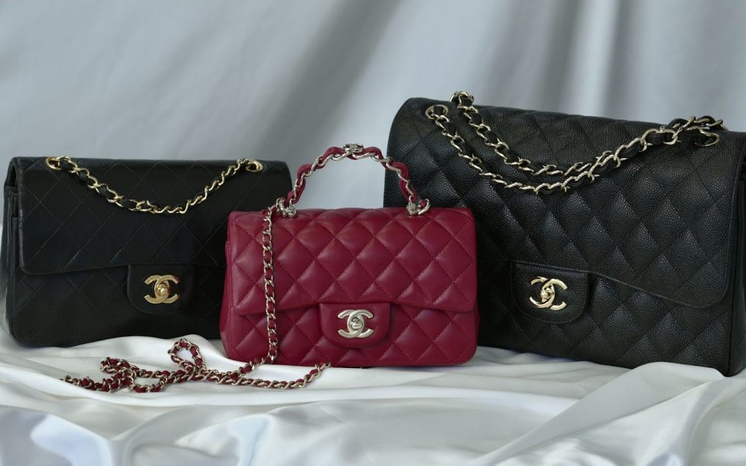 Three Chanel quilted handbags — two black and one red — displayed on a satin surface, showcasing luxury couture craftsmanship.